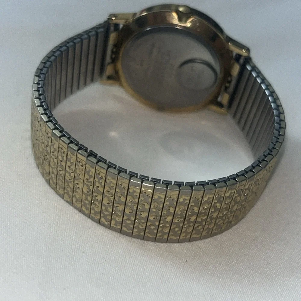 Vintage Gold Band Timex Watch. LA CELL. White Face. Metal Band. Needs Battery‎